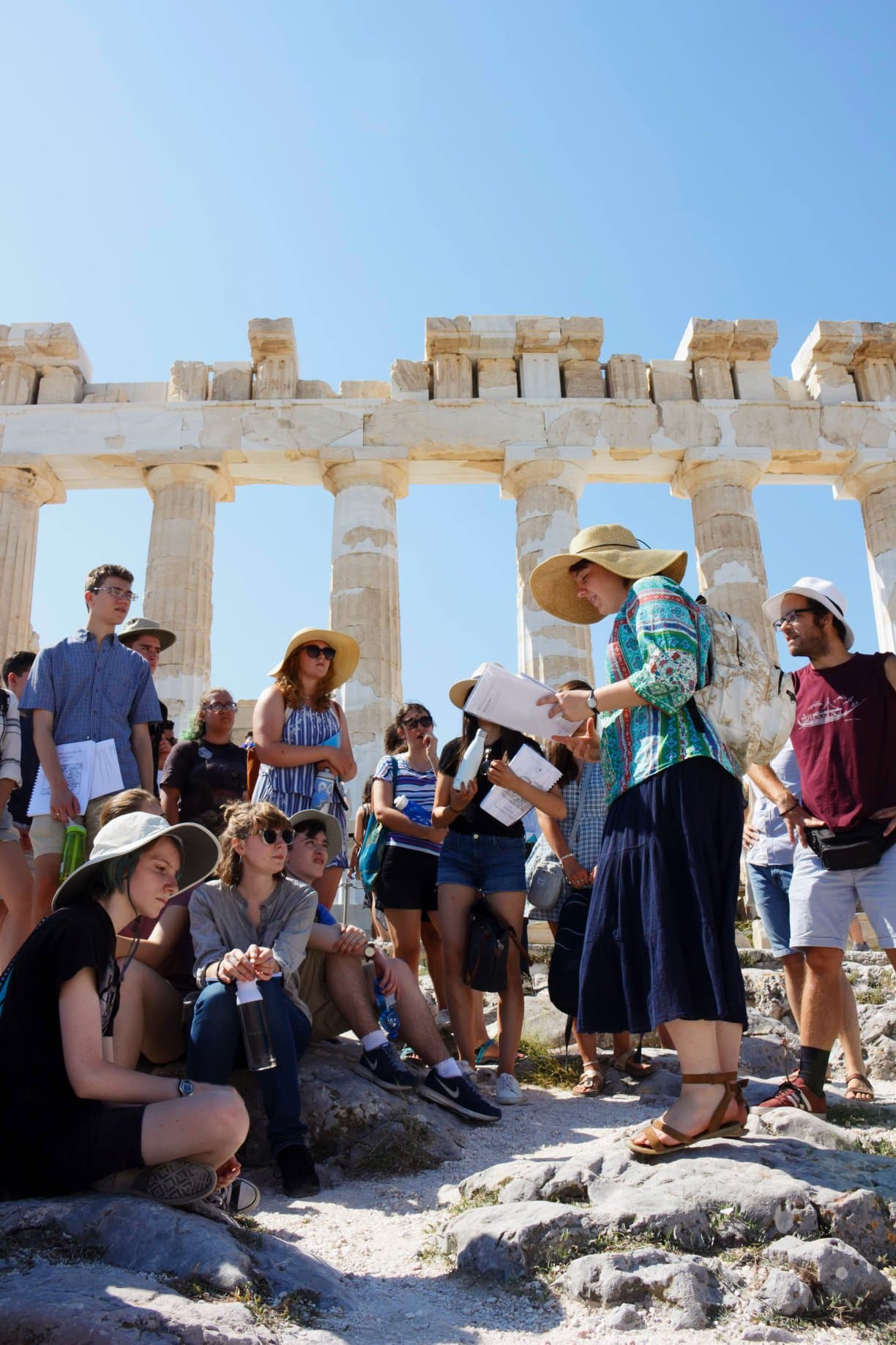 The group visits the Parthenon in Athens