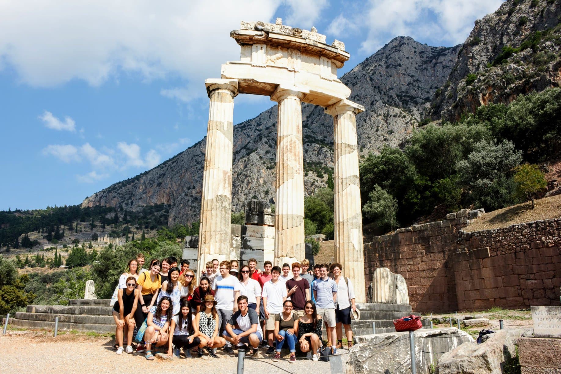 A group photo in front of the round Tholos temple in Delphi